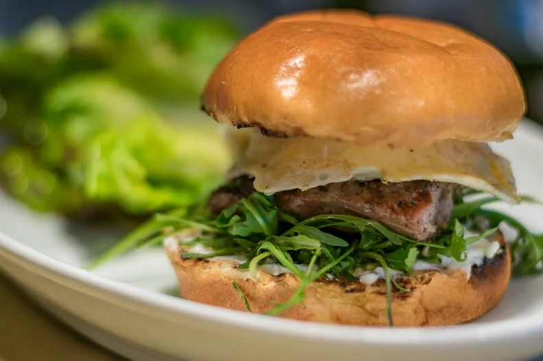 A taste of Emilia-Romagna is tucked away in the Arts District at Rossoblu from Chef Steve Samson, Dina Samson and Hans Luttmann, and there's a dish on the family-style brunch menu that you'll want to keep for yourself: the breakfast sandwich. Sharing will seem difficult to impossible when the sandwich hits your table with its milk bun, stracchino, fried egg, arugula, salsa verde and housemade sausage. Vegetarians can swap the meat for trumpet mushrooms for an equally good time.