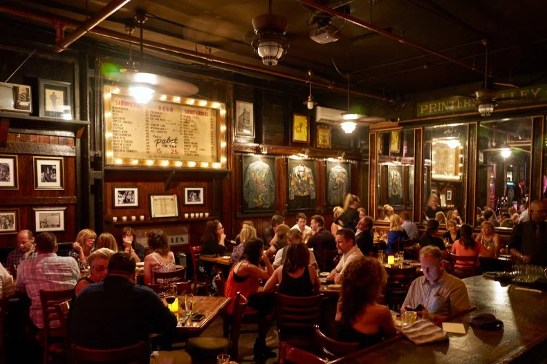 For a taste of old Nashville, duck into nearly hidden entrance of Skull’s Rainbow Room at the heart of Printers Alley. Inside, there’s a revived 1940s-era speakeasy whose platform stage has been graced by Elvis, Johnny Cash, Bob Dylan and more. Home to a nightly burlesque show and live music throughout the week, it’s a swanky spot to grab an Old Fashioned or the signature Rainbow Room, made with vodka, ginger, pineapple and a cava floater. In a nod to the place’s storied past, folks here dress the part — think dapper and dandy. There’s a full menu nightly, too, with options like pork chops and rack of lamb.