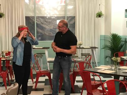Kaitlyn Pislbury is in shock as Robert shows her the new digs, as seen on Restaurant Impossible, Season 14.