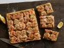 Garlic, Parsley, Parmesan, Lemon, Shrimp, Pizza Dough, Sesame Seeds.