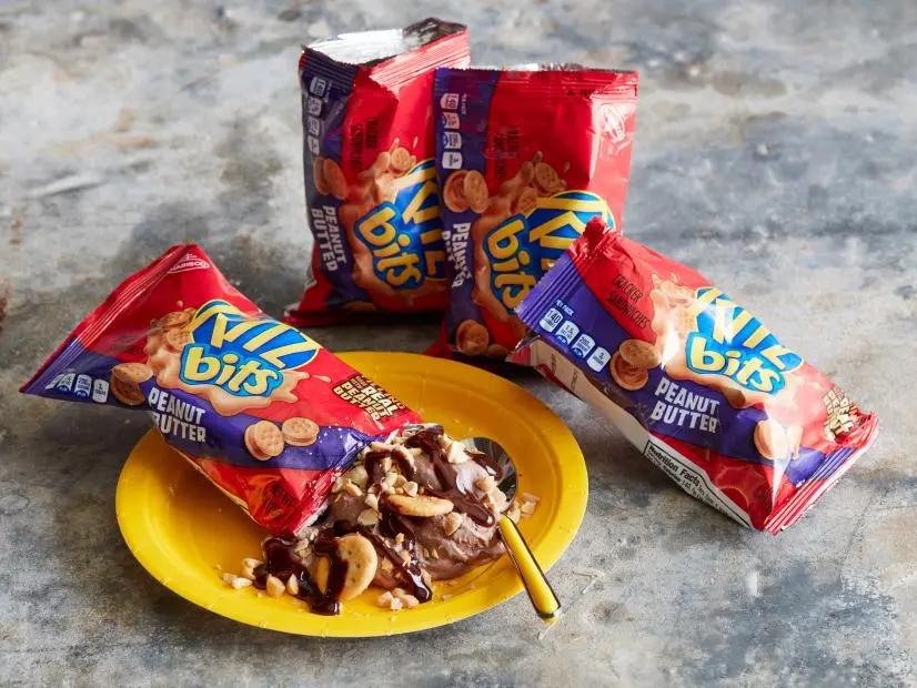 Nutter Butter Cookies, Chocolate Pudding Cups, Whipped Cream, Chopped Peanuts, Chocolate Syrup.