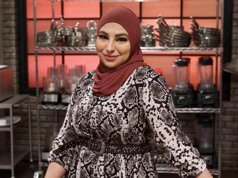 Recruit Nina Kharoufeh poses, as seen on Worst Cooks in America, Season 17.