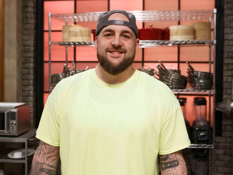 Recruit Peter Smerlas poses, as seen on Worst Cooks in America, Season 17.