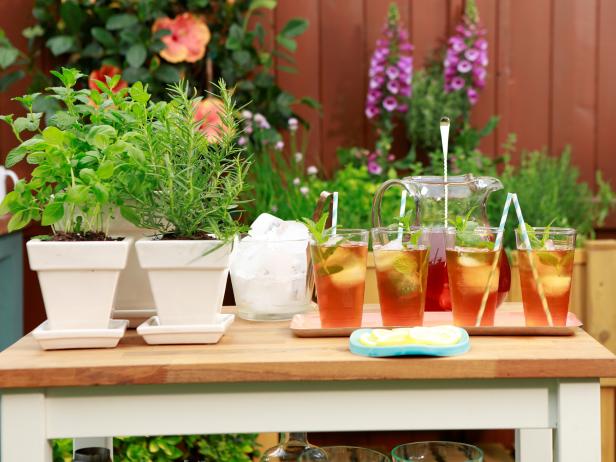 Geoffrey Zakarian makes a Garnish Garden for an Outdoor Bar Cart with Kardea Brown, as seen on Food Network's The Kitchen