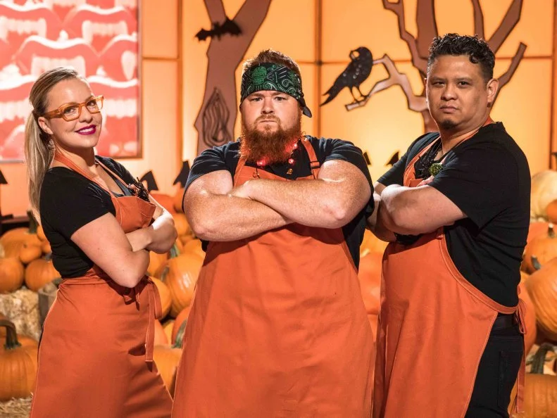 TRIO OF TERROR, Tator Edwards (Pumpkin Carver), Kristen Eagles (Cake Decorator), Frederick “Froggie” Isla (Sugar), as seen on Halloween Wars, Season 9