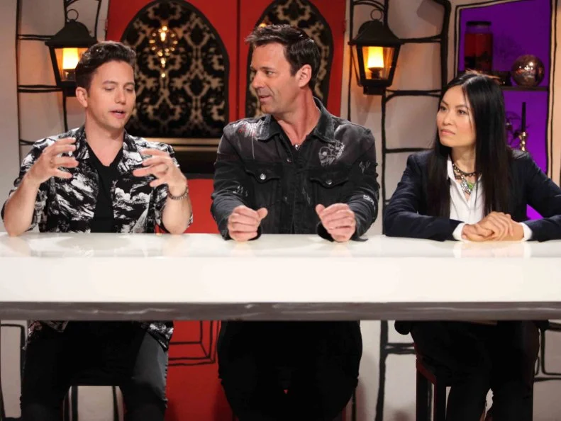 Guest judge Jackson Rathbone discusses with judges Todd Tucker and Shinmin Li , as seen on Halloween Wars, Season 9.