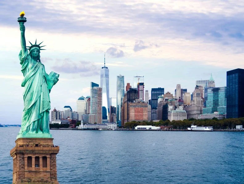 The statue of Liberty with World Trade Center background, Landmarks of New York City