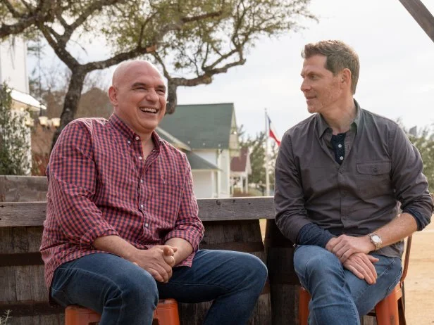 Chefs Michael Symon and Bobby Flay on set, as seen on BBQ BRAWL Flay V Symon, Season 1.
