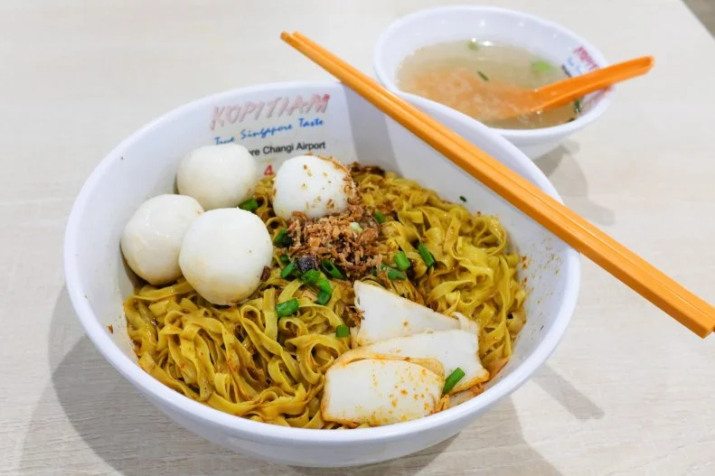 This hidden gem is truly hidden. Inside Terminal 1 and 2 of Changi Airport, there are designated food courts for employees to grab their favorites during break time. But what most people don’t know is that it’s also open to the public. After you ask around and find these canteens, you can get your fill of Hainanese Chicken Rice, Nasi Lemak, Bibimbap and other dishes for less than you’d spend nearly anywhere else. It’s a truly local dining experience without ever leaving the airport.