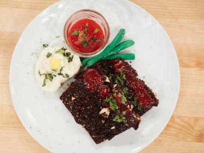 Contestant Cole Frederickson's Main Heat dish, Meatloaf with Coffee Chocolate Cake "Meatloaf", Strawberry Coulis "Ketchup", Hazelnut Banana Buttercream "Mashed Potatoes", and Green Modeling Chocolate "Green Beans", as seen on Food Network's Kids Baking Championship, Season 3.