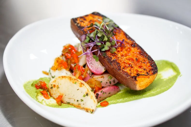 There’s a lot of history on Columbia’s Main Street — it’s been a hub since the city’s founding in 1786. Head up to the Hendrix roof to see it from a new perspective. Expect twists on traditional dishes here like loaded potato gnocchi with cheese, bacon, onions, sweet peas and crème fraiche, and an open-faced pork belly Cuban with local honey, pickled cabbage and their own bread-and-butter pickles.