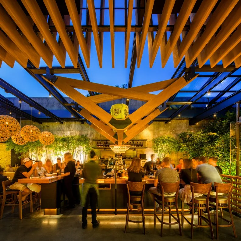 An architectural stunner, Izakaya Den is a huge draw year-round, but warmer weather brings flocks of people to the rooftop. The retractable roof is a nice perk for the inconsistent weather, but the food is spot-on year-round with izakaya-style small plates filled with shrimp and lobster wontons, freshly sliced sashimi and seared wagyu ribeye with pickled mushrooms.