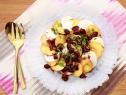 Katie Lee makes a Peach Caprese Salad with Balsamic Cherries, as seen on Food Network's The Kitchen