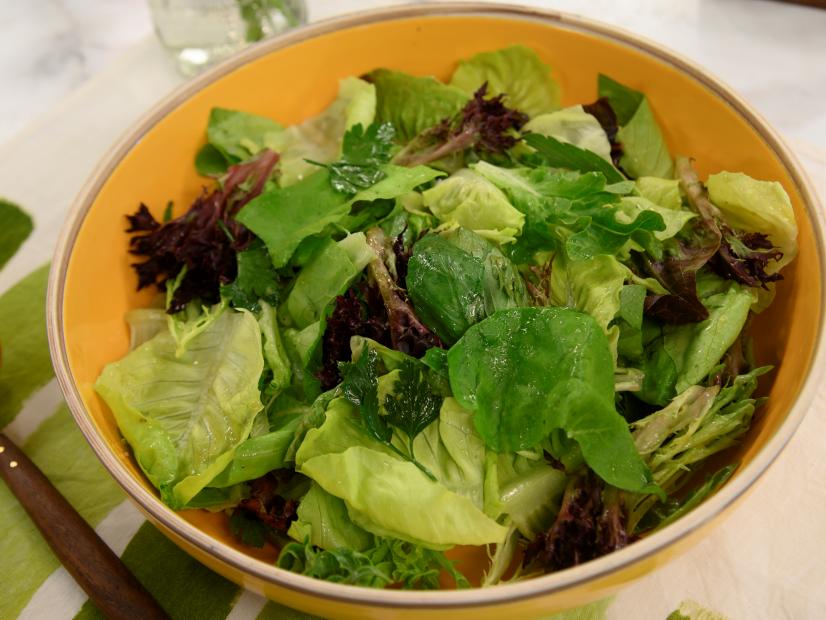 A salad with herbs, as seen on The Kitchen, Season 22.