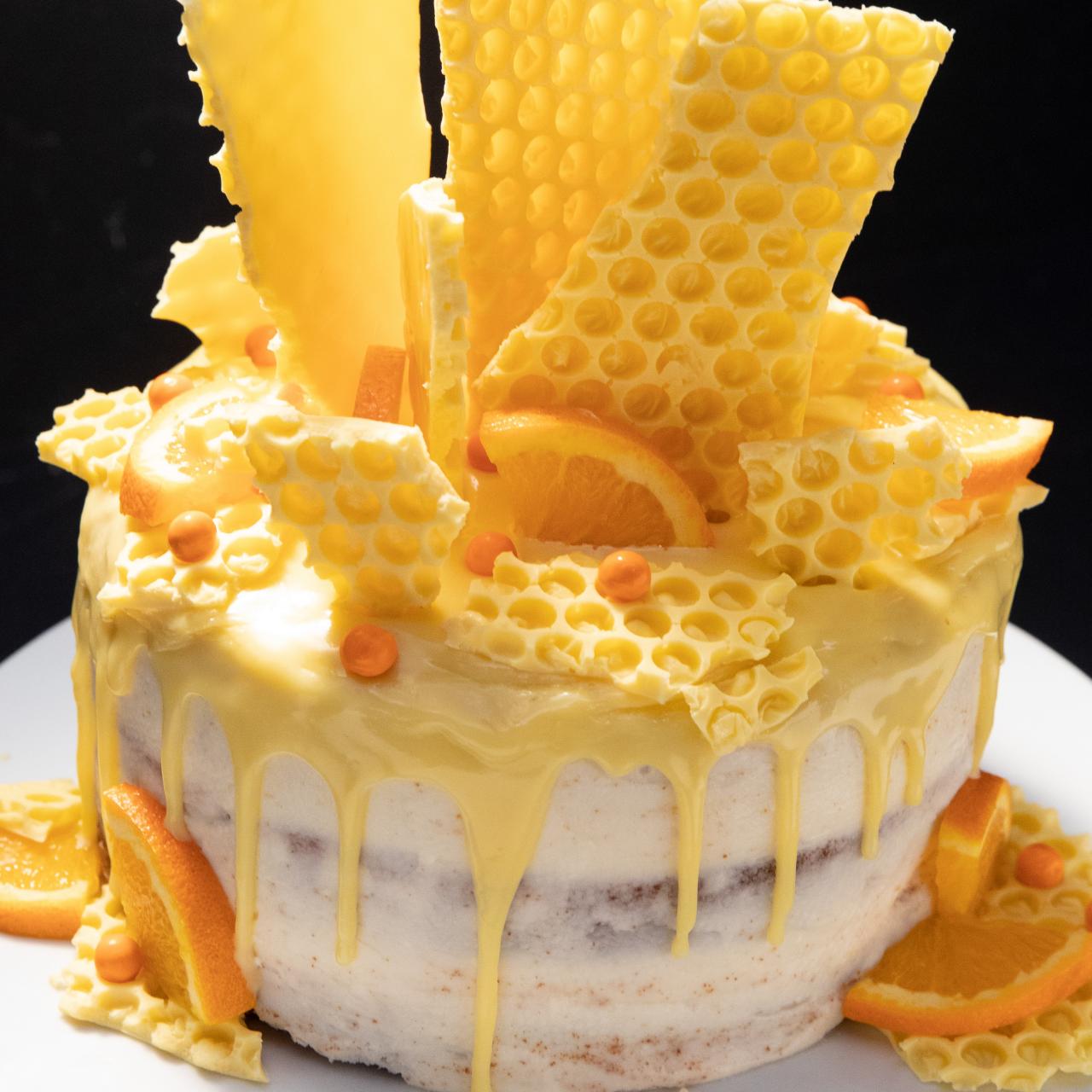 Honey & almond layer cake recipe | Good Food
