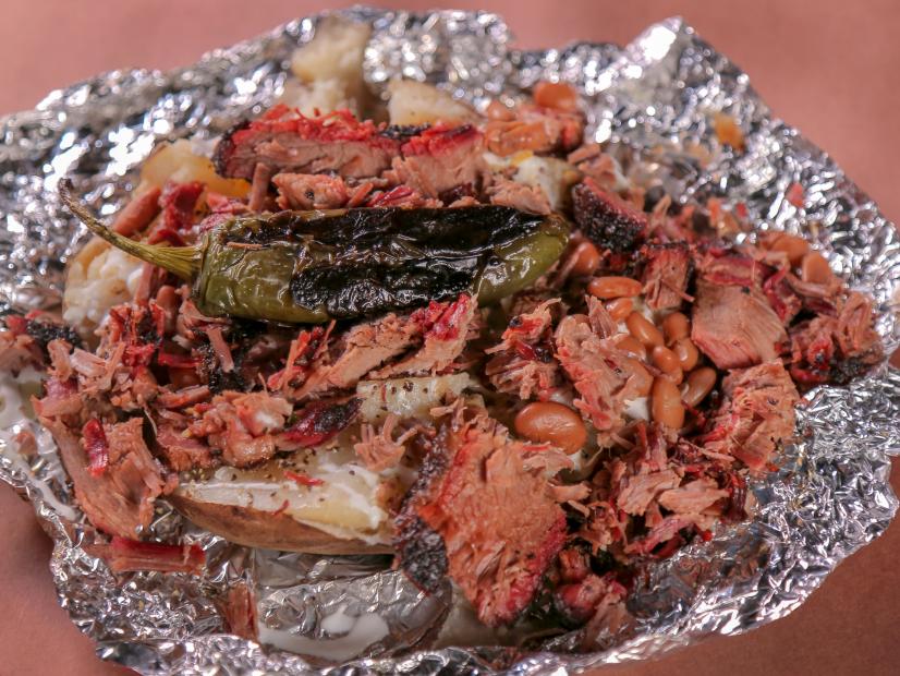 El Paso Loaded Baked Potato as Served at Desert Oak Barbecue in El Paso, Texas, as seen on Diners, Drive-Ins and Dives, Season 30.