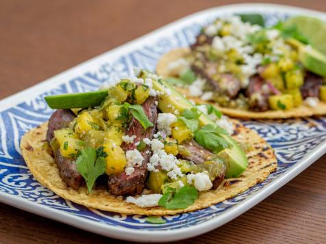 Grilled Marinated Skirt Steak Tacos with Pineapple Salsa and Tomatillo Sauce