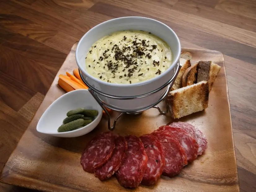 Anne Burrell's Black Truffle Fonduta is displayed, as seen on Worst Cooks in America, Season 17.