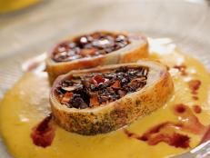 <p>This modern Scandinavian eatery is bringing one of a kind dishes to the Midwest, like their savory take on strudel. Instead of a sweet filling, they stuff the typical puff pastry with a mix of roasted mushrooms and goat cheese before baking. The crispy pastry is then served over a cream made with aquavit, a Scandinavian spirit similar to gin, and is drizzled with a mulled wine sauce. One bite of the dish immediately reminded Guy of food he had as a student traveling in Norway: &ldquo;The concentration of flavors is through the roof,&rdquo; he said.</p>