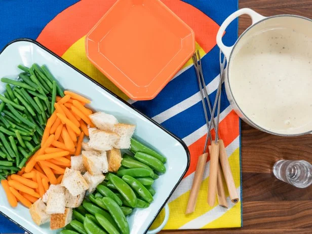 Geoffrey Zakarian gives classic cheese fondue a retro remake, as seen on Food Network's The Kitchen