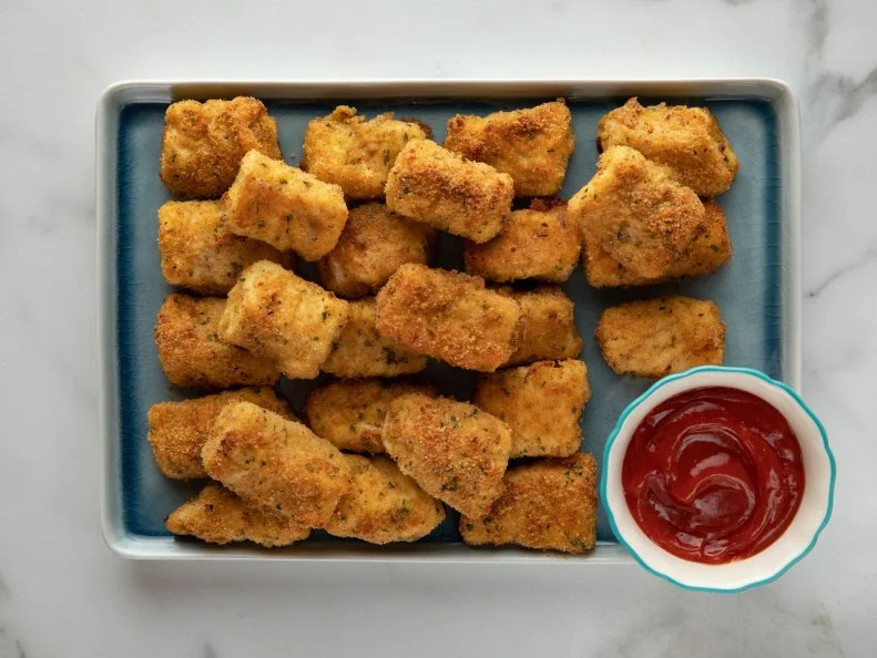 Close-up of Parmesan Fish Sticks, as seen on The Pioneer Woman, Season 23.