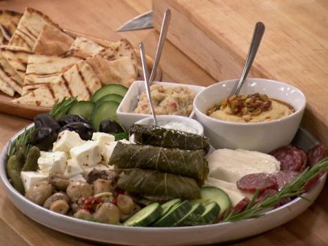 Dolmades (Stuffed Grape Leaves with Currants and Pistachio)