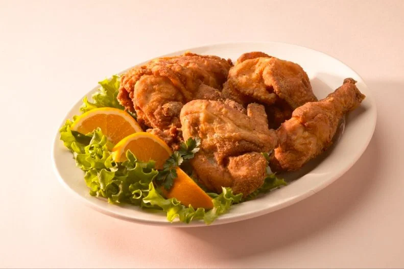 The Ox Yoke Inn, a historic family-style restaurant serving German and American food, is a National Historic Landmark, in a home built in 1856. The restaurant has remained a popular spot since 1940 thanks in large part to its fried chicken. Dusted in well-seasoned breading and deep-fried, the chicken is so popular, the restaurant serves over 41,000 pounds of it each year.