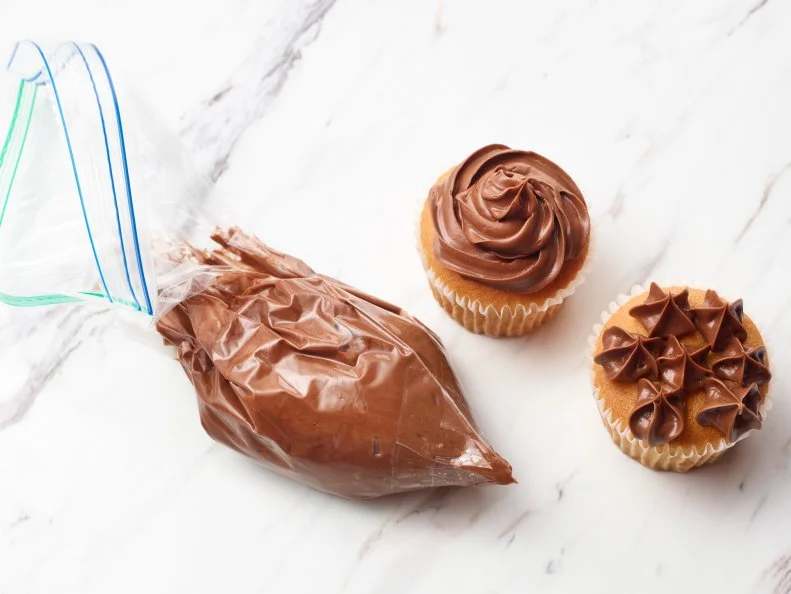 Food Network Kitchen’s TESTED COOKING HACKS GALLERY - Make a Star Piping Tip with a Ziploc Bag, as seen on Food Network.
