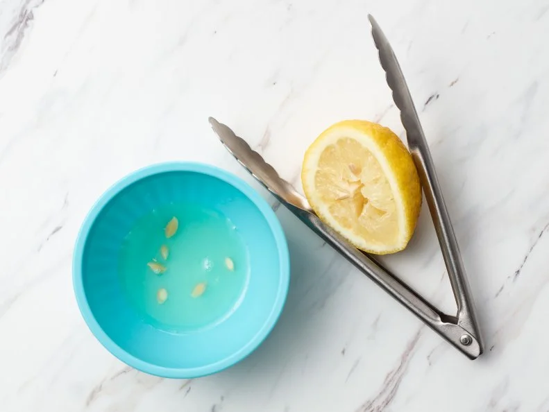 Food Network Kitchen’s TESTED COOKING HACKS GALLERY - Tongs Citrus Juicer, as seen on Food Network.