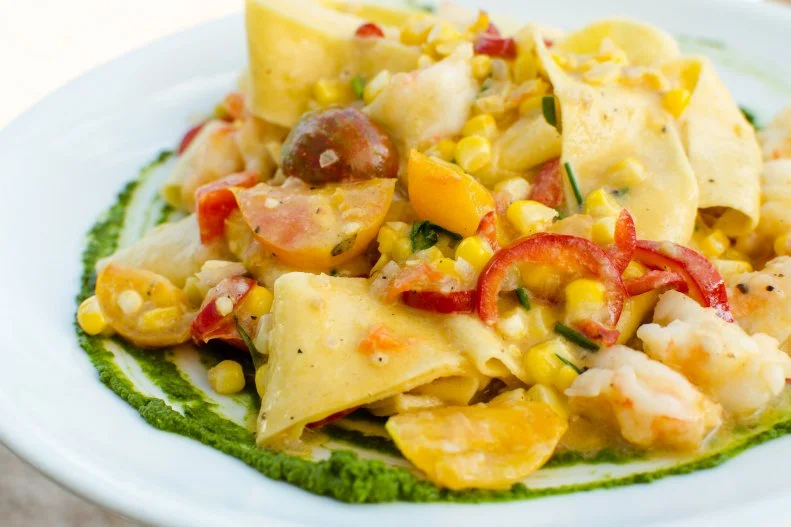Nodding to Houston’s gulf-adjacent location and Texas’ corn-fed heritage, chef Ryan Pera makes a fantastic mash-up at Coltivare with corn and shrimp tagliatelle. Made with sweet corn from the restaurant’s own garden, local Gulf shrimp, squash blossoms, chiles, herbs and housemade tagliatelle, it’s basically a taste of Houston summer on one delicious — and beautiful — plate.