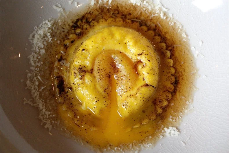As Oscar Wilde once said, “Imitation is the sincerest form of flattery…” Chef Michael Tusk has certainly had his share of imitators for this innovative raviolo. (Many of those imitators like chef Nancy Silverton are pretty darn great on their own.) Originally on the menu at Quince but brought over to more casual Cotogna when it opened and evolved over time, the single piece of stuffed pasta is a must-order. These days, a delicate egg yolk pasta shell is filled with fresh ricotta and an egg yolk and poached until the exterior dough cooks and the yolk hits the perfect runny consistency. Drizzled with brown butter, the yolk- and dairy-based sauce comes together like a slowly oozing volcano when your fork releases the egg onto the plate.