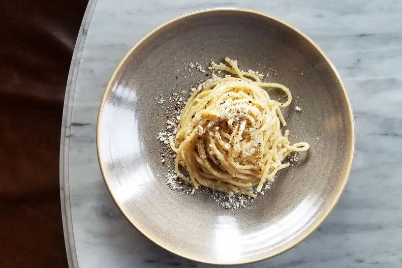 Felix chef Evan Funke is a pasta virtuoso. He understands pasta shapes and how particular sauces cling to them, so that they marry from two separate components into one cohesive unit. The restaurant has been one of the hottest tickets in Los Angeles since opening, with pastas broken out by region of origin within Italy. While every pasta on the menu is worthy of sampling, the one that stands out the most and gets the most press is the tonnarelli cacio e pepe. The fresh, squared spaghetti is blended with just black pepper and Pecorino Romano somehow ends up delicate and light, but with so much nuance and depth, you’ll wonder what kind of magic went into it.