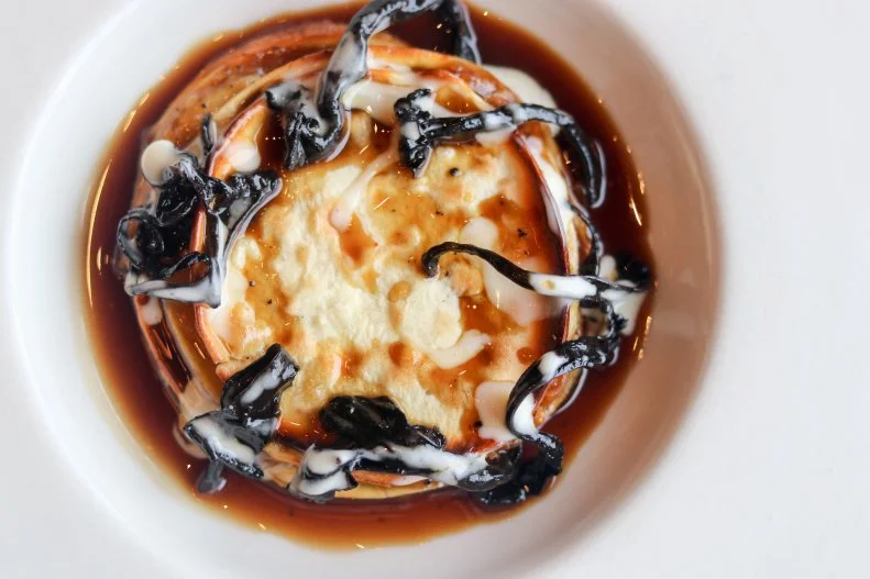 If one is raising the subject of Italian cuisine in America, Frasca Food & Wine in Boulder is a near-mandatory part of the conversation. The multi-award-winning restaurant by master sommelier Bobby Stuckey and chef Lachlan Mackinnon-Patterson is one of the U.S. leaders of regional Italian cuisine, specifically that of northern Friuli-Venezia Giuli. The Pastichio in Primavera was actually developed in Italy by executive chefs Eduardo Valle Lobo and Kelly Jeun while traveling. Layered like a lasagna — but nothing like the lasagna common in the States — it combines alternating bands of braised rabbit and Harbison Cheese from Jasper Hill Farm with black truffle and black trumpet mushrooms. It’s great on its own, but it’s best enjoyed with a wine from the restaurant’s collection of 200 varieties.