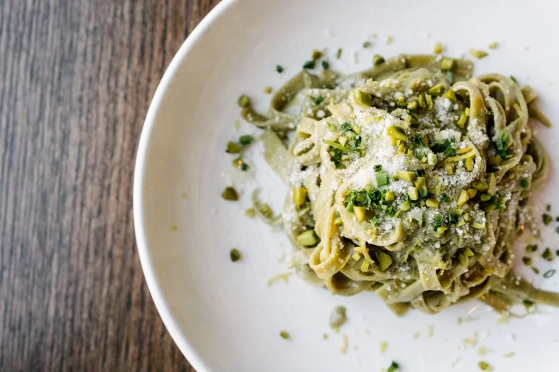 Four-time James Beard Award semi-finalist Clay Conley is one of the most-respected chefs in all of Palm Beach County. So, it should be no surprise that his casually elegant Italian restaurant, Grato, has earned a spot as one of the best pasta purveyors in the region. Most of the pastas on the menu are made in-house, and all are good — the Sunday gravy and bucatini carbonara are perennial crowd-pleasers — but the hand-cut farro tagliatelle is hard to replicate. Made from farro, an Italian grain that’s low in gluten, high in nuttiness and sweetness, the long, flat ribbons of pasta have a unique, rich flavor that makes a great base for its brown-butter sauce. The savory strands are topped with pistachio, lemon and a hearty sprinkling of parmesan.