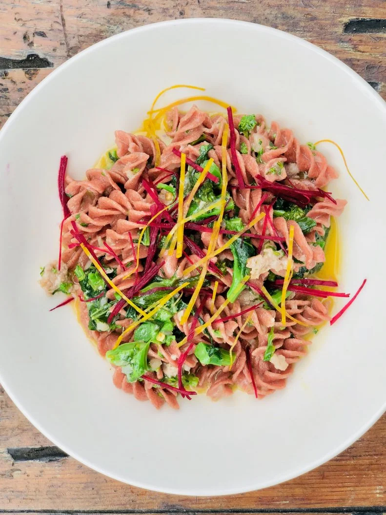 The Fusilli Integrali di Barbabietole con Salsiccia was inspired by the ubiquitous beet and goat cheese salad combination. To bring it together, Morandi’s Gabriele Carpentieri roasts beets to intensify the flavor, purees them, mixes the liquid with whole wheat flour and passes it through the extruder into a corkscrew shape. When an order comes through, the team sautés a bit of spicy sausage and broccoli rabe in white wine. The pasta goes into the sauce and its finished with some grated sheep’s milk-based Pecorino Romano cheese, which Carpentieri says, “Has a very sharp flavor similar to goat cheese."