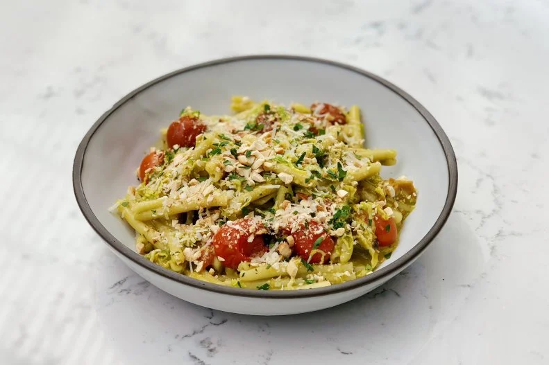 Renowned Michelin-starred chef Josiah Citrin took over the greenhouse poolside restaurant at the LINE Hotel in Los Angeles’ Koreatown, bringing with him a menu of shareable dishes with an array of different cultural influences. Openaire’s menu spans cultures, continents and styles, but the pastas and grains epitomize the seasonally driven California fare with bold ingredients and flavor combinations that aren’t found in many other restaurants, such as the beloved casarecce. Sicilian-style short twists of pasta that are paired with Brussels sprouts, burst tomatoes and a peppery, creamy arugula-cashew pesto.