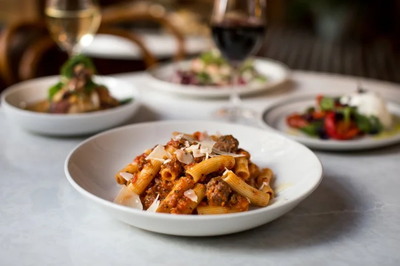 James Beard Award-winner Vitaly Paley serves upscale New York-style Italian with the help of Long Island native Kenny Giambalvo in the back room of his fourth restaurant, Rosa Rosa. (The front room focuses on more pan Mediterranean-style fare.) It’s not the trendiest or flashiest dish on the menu, but Nana’s Sunday Gravy and Rigatoni is one of the standouts. Fresh rigatoni is soft and supple, coated in a richly layered combination of four savory meats in sweet tomato sauce that tastes like it came straight from an Italian nonna’s kitchen.