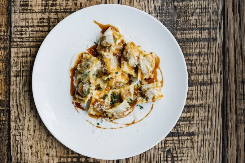 It seems that Texas native Ford Fry can do just about anything he puts his mind to. He updated Southern fare at his first restaurant, JCT Kitchen & Bar, on Atlanta’s Westside, and has taken on assorted cuisines, to great acclaim, ever since. At St. Cecilia, Ford excels at Mediterranean dishes, including pasta. His short list hits on a bunch of coastal classics, but it's the agnolotti that really stands out. The savory yet still delicate dish features red wine-braised beef stuffed inside the light pockets of pasta with a rich Parmigiano crema and some woodsy sage.