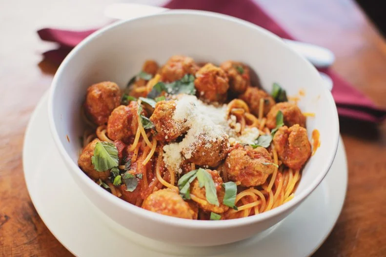 Trattoria La Sorrentina owner Giacomo Vanacore’s family has been making spaghetti polpettine since the late 1800’s when they first immigrated to the United States from Italy. When the clan moved back to Italy after World War I, they brought the dish, essentially spaghetti with small meatballs, back with them. “Growing up in Italy, my mother would cook spaghetti with meatballs and all my friends wanted to come over to eat since the other families did not cook this dish,” says Vanacore. It’s now the best seller at his North Bergen trattoria, where about a dozen or so of the tiny beef rounds are served atop spaghetti and onion- and garlic-scented San Marzano tomato sauce.