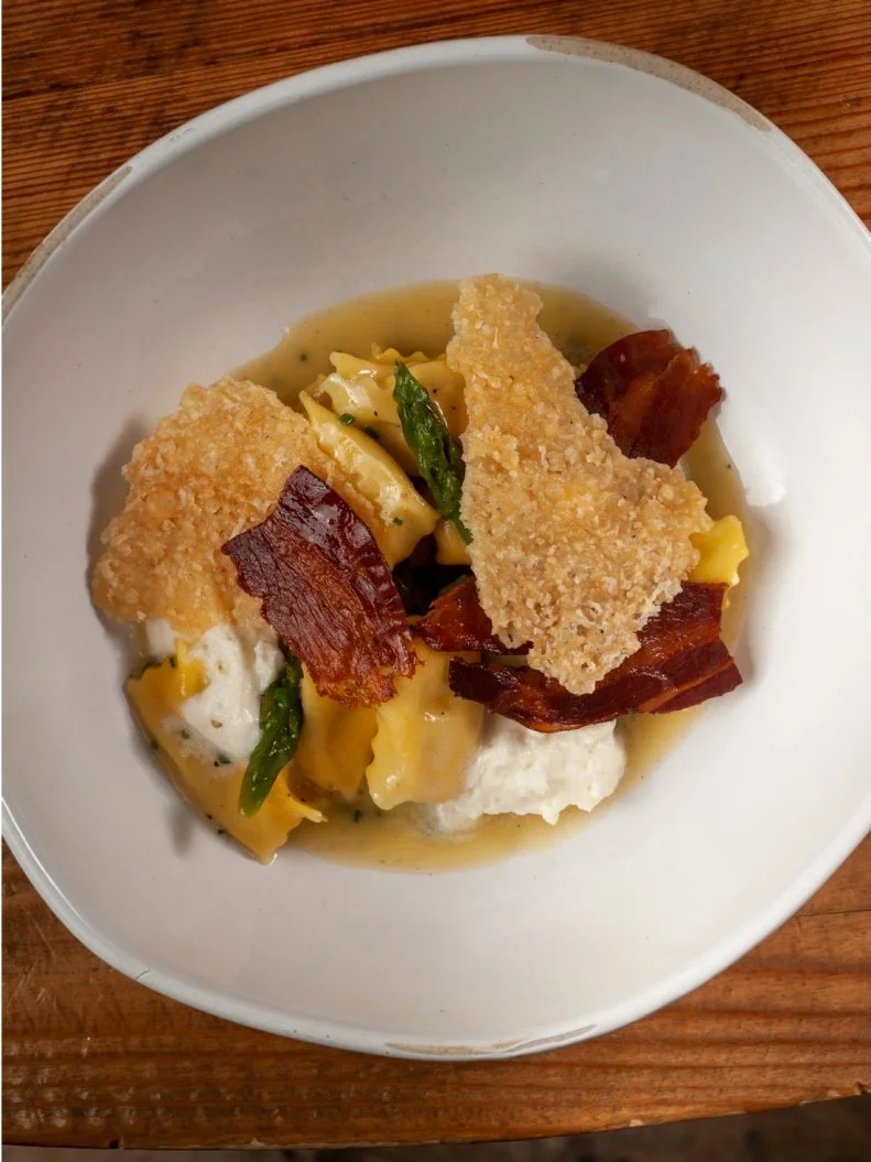 Chef Giovanni Rocchio spends four hours making the pasta for his menu at Valentino Cucina Italiana every single day. There’s a reason his restaurant is among the best in Broward County: his evolving pasta selections are completely innovative and perfectly prepared. The current star is the agnolotti carbonara. Delicate pockets of house-made agnolotti are filled with a carbonara custard, a blend of egg yolks, pecorino cheese, black pepper and cream. Once cooked, those little pillows are dressed with parmesan cheese foam, crispy pancetta and asparagus.
