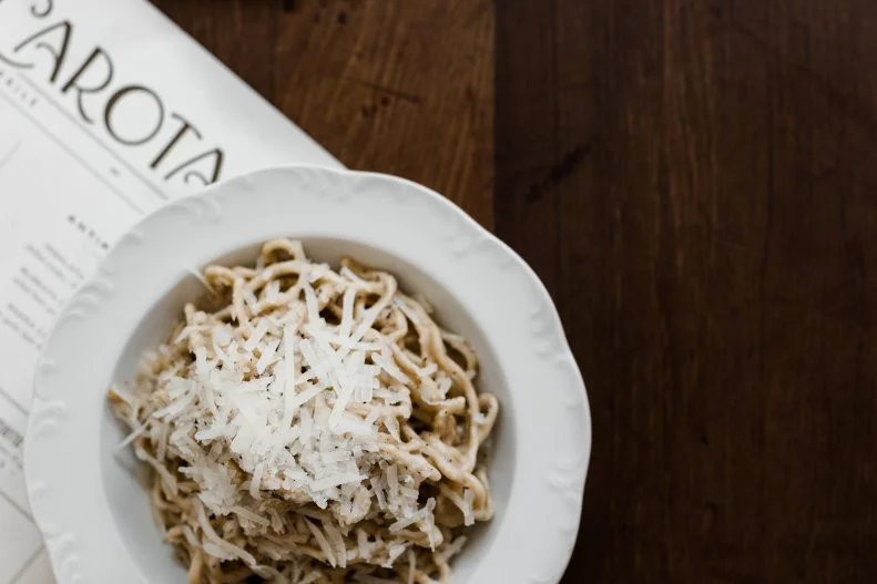 Jody Williams and Rita Sodi are two of the most-talented chefs making pasta in the entire United States, so you can bet that the cacio e pepe at their Via Carota is a worthy rendition.  It’s simple and stays true to what the dish is supposed to be: a silky blend of butter, freshly ground black pepper, some starchy pasta water (they make a lot of pasta here, so their pasta water is extra starchy), sheep’s milk Pecorino Romano and dried tonnarelli (a.k.a. spaghetti alla chitarra), an egg-based long pasta that’s similar but chewier than spaghetti. It seems like it should be easy to replicate, but these pros take it it a level home cooks only wish they could emulate.