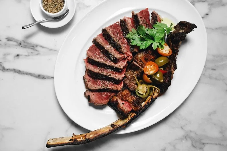 Bill and Giuliana Rancic partnered with well-known Chicago restaurant group Lettuce Entertain You to create an Italian concept based on some of Giuliana’s family recipes. The spot was so wildly successful, they added a steakhouse to the mix with RPM Steak (then the seafood-focused RPM on the Water). This swanky steakhouse takes a modern approach to classics, with coal-roasted king crab, a black truffle and fontina “Millionaire’s” potato and a rib-eye filet called “The Duke,” for the couple’s son.