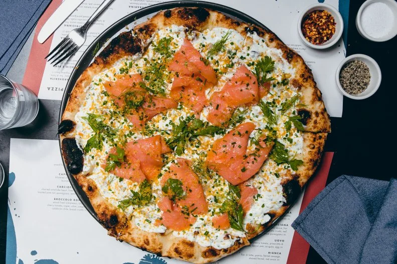 Actor Chris O’Donnell and his wife paired up with Candace Nelson (of Sprinkles cupcake fame) and her husband to create Pizzana, a Neapolitan-inspired restaurant in the heart of Brentwood, on the Westside of Los Angeles. They worked with Italian native chef Daniele Uditi to create clever spins on classic pizzas, like the Corbarina with San Marzano tomatoes, squash blossoms, cherry tomatoes, burrata and a gremolata, and small plates like wood-fired meatballs or a shaved brussels sprout salad with apples and toasted pistachios.