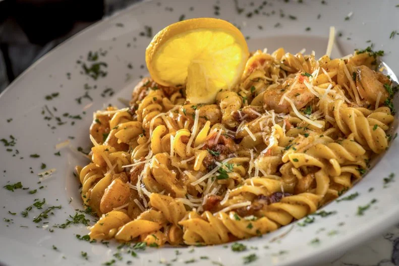 Channing Tatum fell in love with the city of New Orleans, and along with partner Keith Kurtz, decided to open Saints and Sinners, a restaurant that exudes the city’s laid-back attitude and rich history. The space conjures red-light districts of yesteryear, with lots of red details, dim lighting and ornate details.  The menu is full of gulf seafood, including a crawfish pie and the shrimp and tasso pasta made with fresh gulf shrimp and chunks of spicy pepper-smoked tasso ham in a creamy rose sauce. A portion of the proceeds from each dish supports hungry children and families around the world.