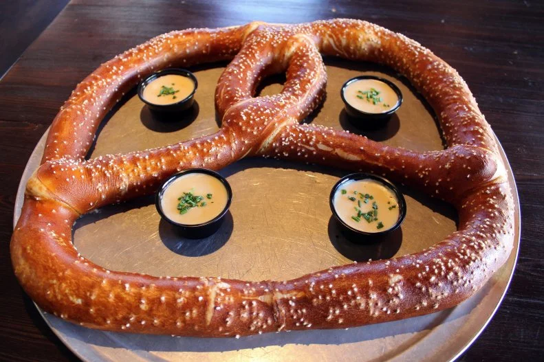 All you should need to know about Brat Haus is that they have giant pretzels. GIANT PRETZELS. Obviously that should be enough, but the exciting news doesn’t stop there. Brat Haus also boasts 28 craft beers on tap and an open-air patio/beer garden in lovely Old Town Scottsdale. It’s the perfect environment to treat yourself to a giant 40-ounce beer and a foot-long brat that goes by the name of “Big Weenie.”