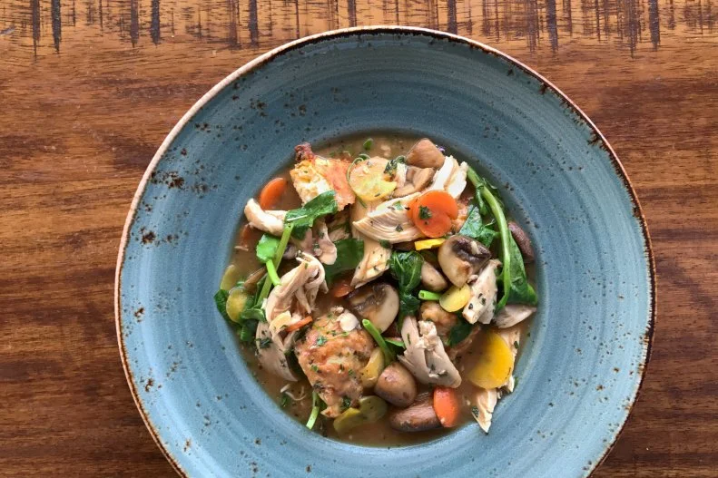 Southern Rail serves elevated comfort food that reflects chef Justin Beckett’s memoires around the kitchen table. He says that his chicken and biscuit dumplings are a classic example of a dish that brings his customers back to “those special home cooked moments.” Photo: Justin Beckett