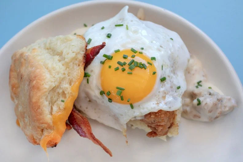 A lot of the menu items at the Welcome Diner were named after songs by the band Ween, which pretty much sums up this restaurant’s vibe. The play list is usually excellent, the bar always open and the food is creative diner fare. Yep, that’s fried chicken and sausage gravy underneath that egg on the “Big Jim,” which also has melted cheddar cheese and bacon underneath that big biscuit.