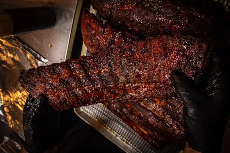 “Simply put, our baby back ribs are the best,” says Jamie “The Bear” McDonald, co-owner of Bear’s Smokehouse BBQ in Hartford. “We not only use a high-quality meat, but we have perfected our secret blend of spices in our Bear’s signature pork rub.” Once smoked, they’re finished with a housemade honey-brown sugar glaze that perfectly caramelizes the exterior.