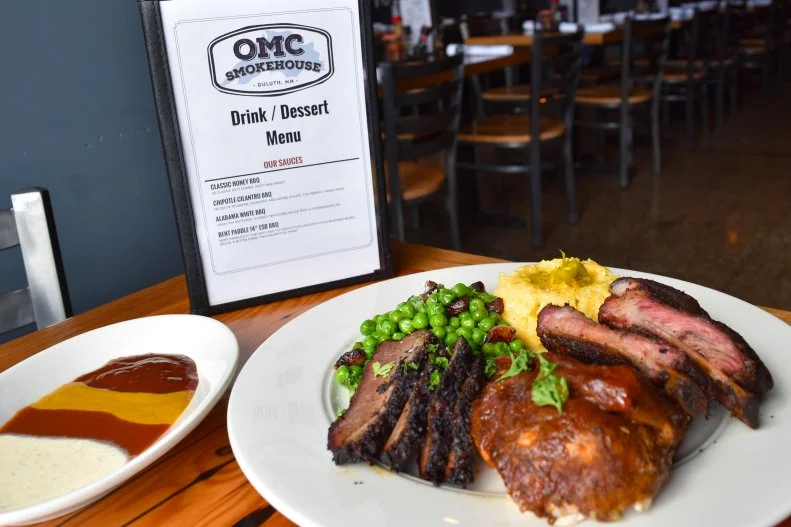 "Minnesota isn’t known as a BBQ destination,” says Louis Hanson, chef at OMC Smokehouse, in Duluth. “Most places up here sauce everything to death but we like to keep it simple: a great spice blend, a high-quality cut of ribs and Minnesota wood.” The result? Ribs smoked with native Minnesota sugar maple and white oak. “It gives people a unique smoke profile — sweetness from the maple and depth from the oak — awesome flavor courtesy of the forests in Minnesota,” he adds. Beef fat fries make an excellent side, as they’re fried in brisket trimmings.