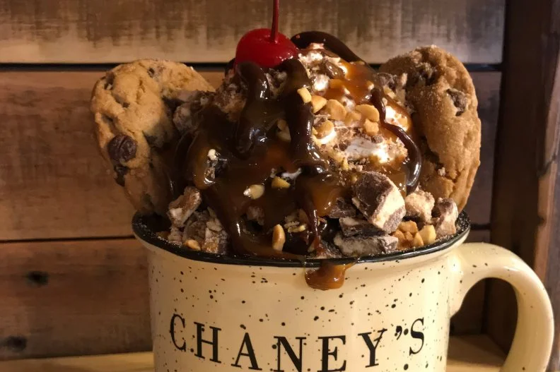 When the weather allows it, you can actually tour the farm and watch the cows being milked at this Kentucky spot — or you can opt to dive directly into its farm-fresh ice cream. Don’t shy away from going big. The Topsy Sundae is full of hidden treats, starting with two scoops of Cow Tracks ice cream (vanilla with Snickers and a caramel swirl) embellished with ribbons of hot caramel and hot fudge, and topped with two warm chocolate chip cookies, crushed Snickers, peanuts, whipped cream and a cherry on top.